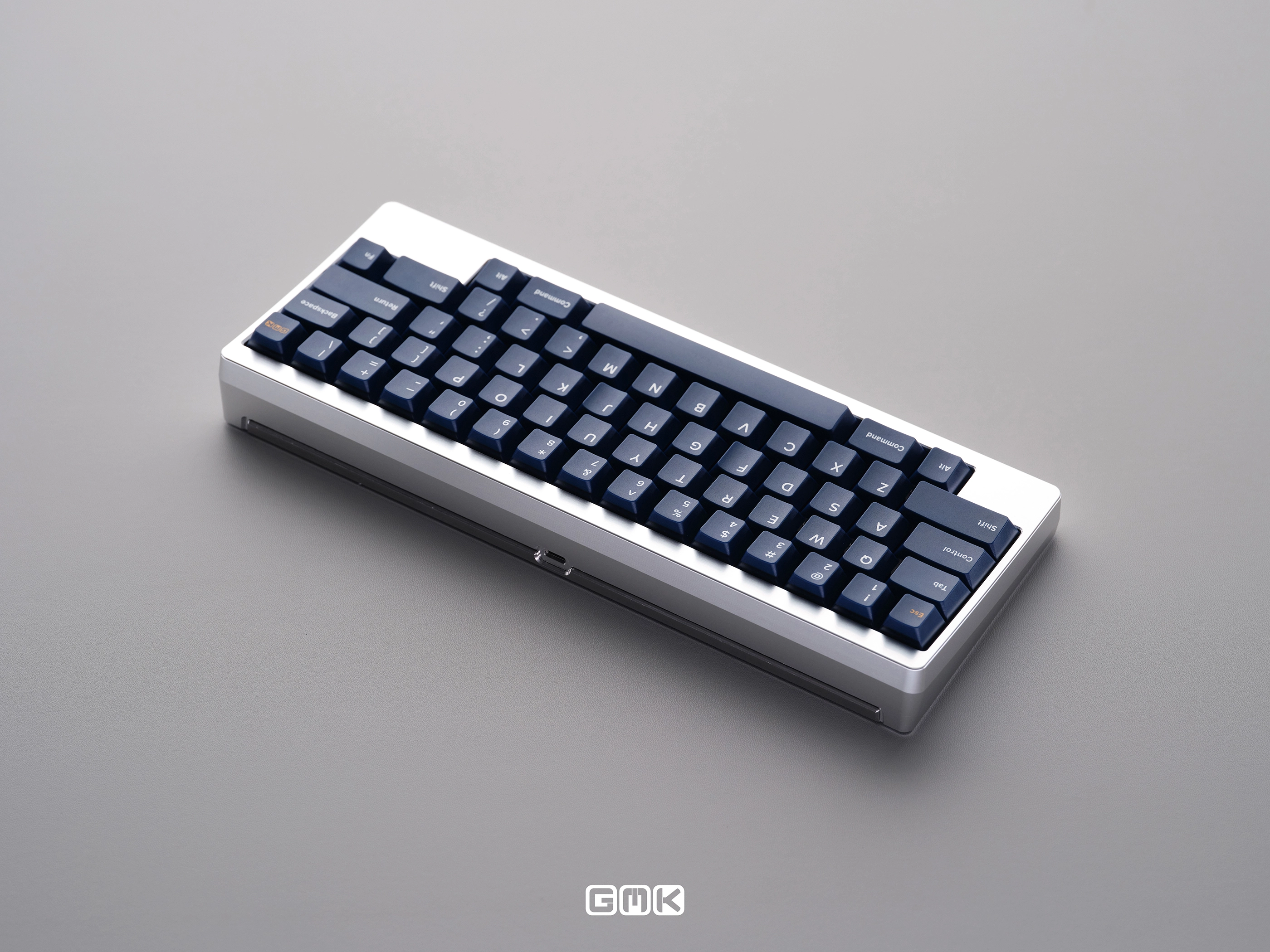GMK CYL Fabrik Keycaps blue keyboard on grey background
